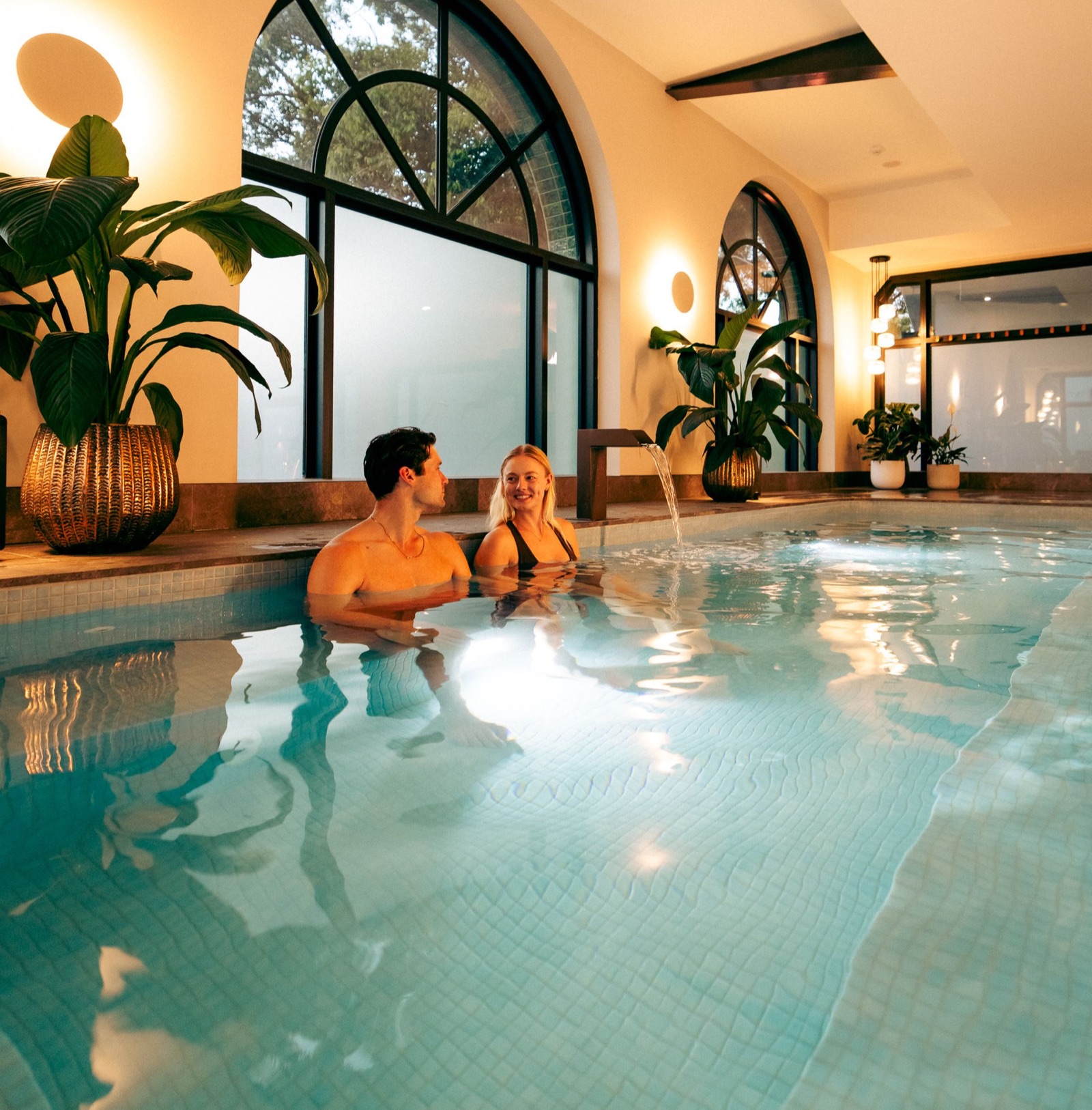 Two friends relaxing together at Escape Bathhouse Chatswood