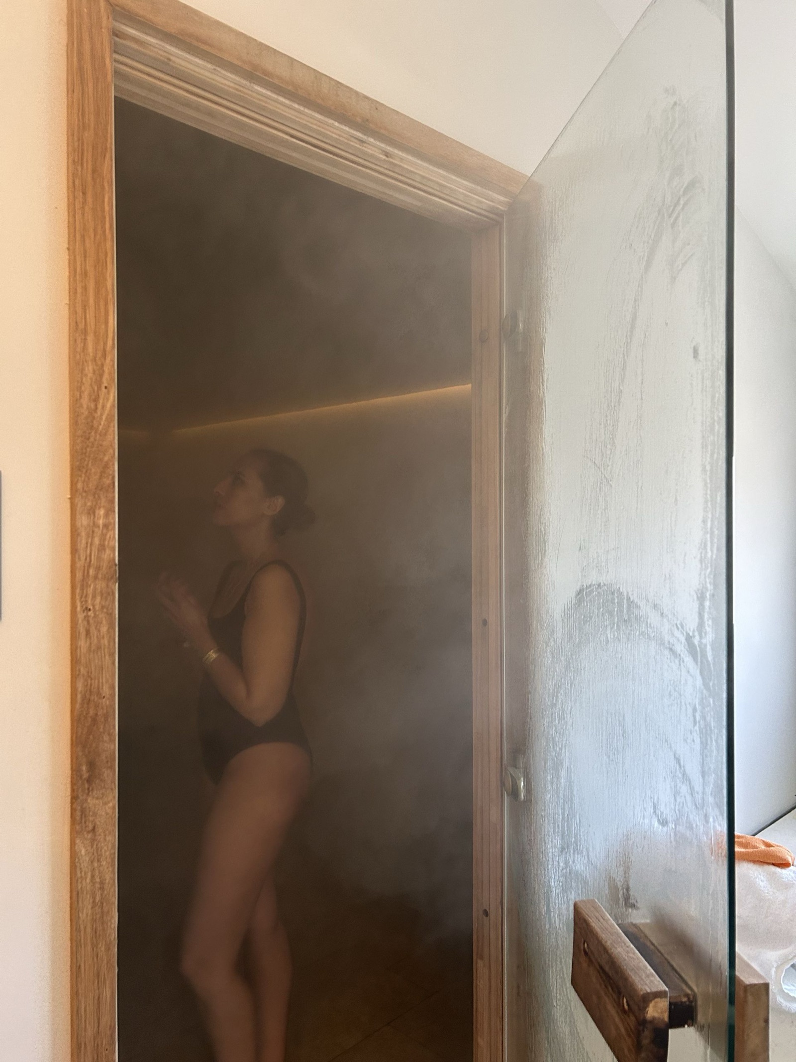 Relaxing in the sauna at Escape Bathhouse Chatswood