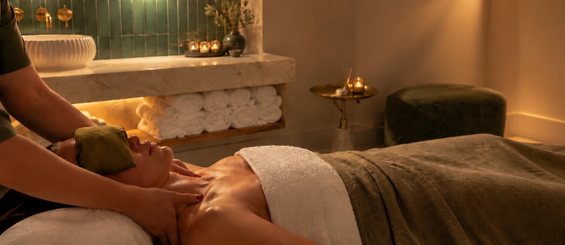 A calm massage treatment room at Escape Bathhouse